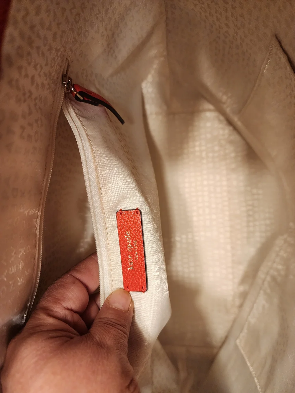 This Kate Spade Larchmont Avenue Logo Penny Tote in chili red